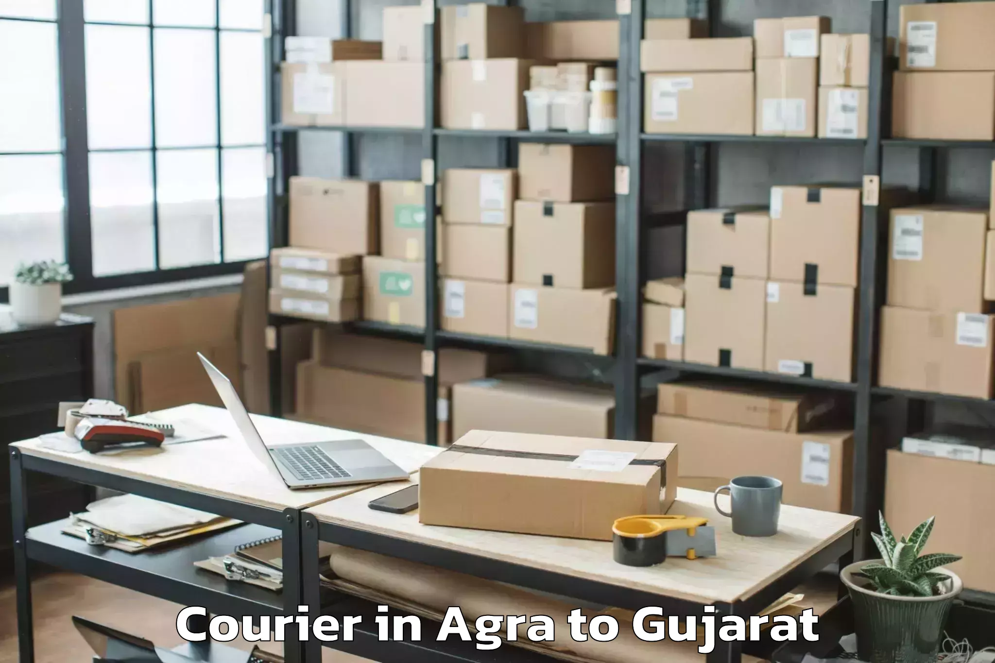 Trusted Agra to Ghoghamba Courier